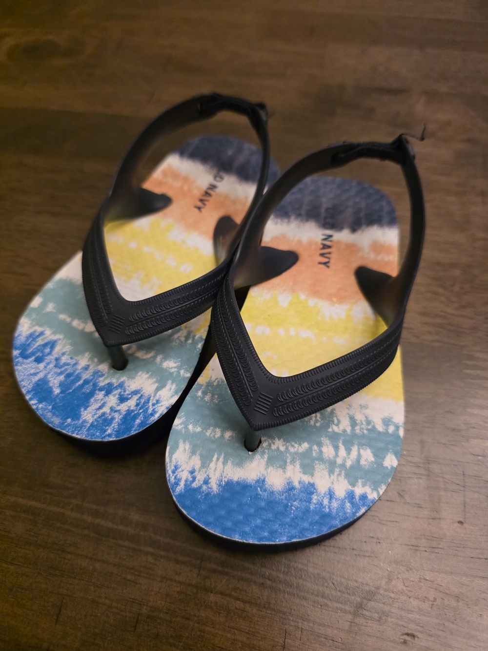 Toddler Old Navy Black Strap Kids Flip Flops with Blue, Yellow & Orange Wave